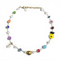 HANAÉ Curated Playful Mix Gemstone Necklace in gold-tone finish, featuring colorful jade, Venetian glass beads, freshwater pearls, cowrie shell accents and playful ceramic details.
